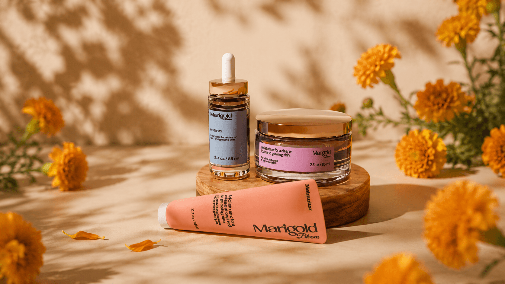 Marigold Bloom complete clinical trio formulation with fresh marigold flowers on wood pedestal